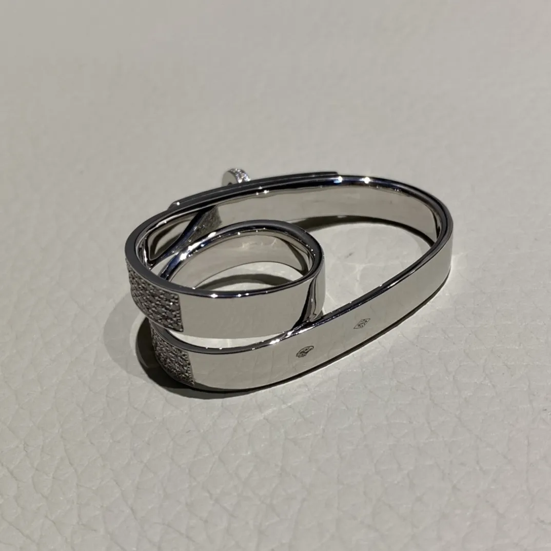 HERMES Женское кольцо из белого золота и бриллиантов HERMES Женское кольцо из белого золота и бриллиантов